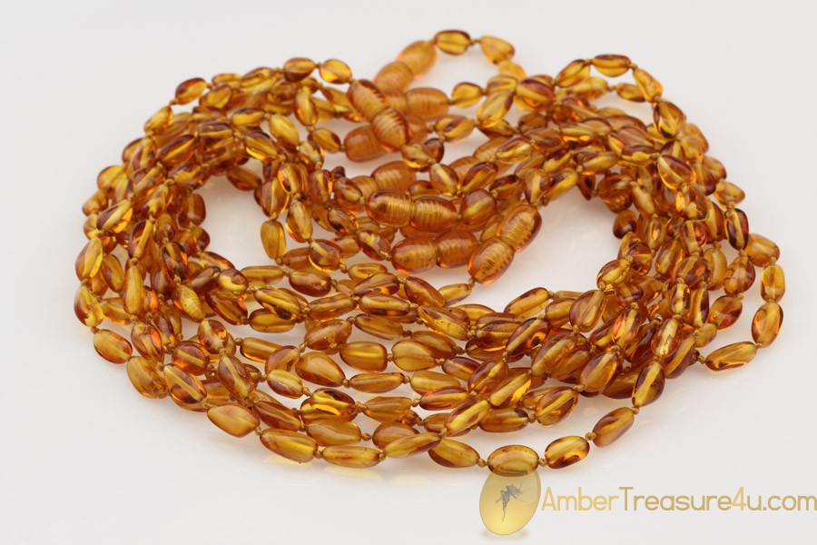 Lot of 10 Baby Teething Flat Olive Shape BALTIC AMBER Necklaces Lot of 10 Baby Teething Flat Olive Shape BALTIC AMBER Necklaces